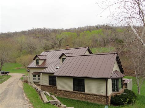 house with brown metal roof